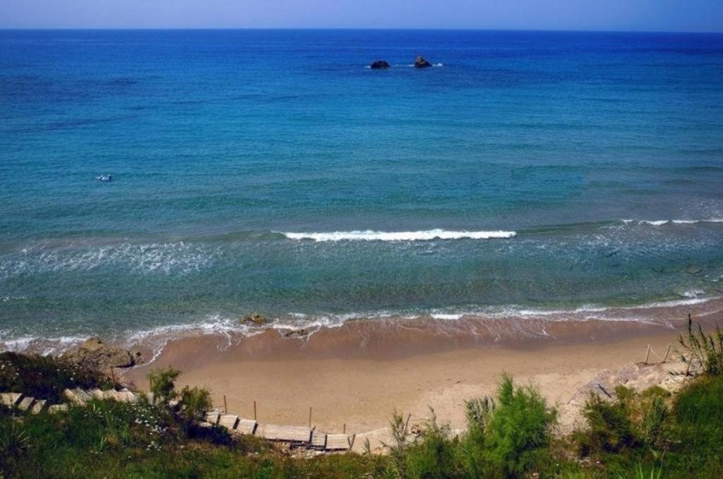 Tetraktys Estate Beachside Υδωρ Ágios Matthaíos Kültér fotó